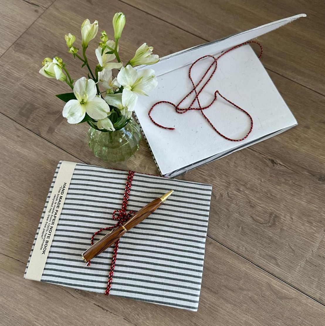 grey_striped_books.png