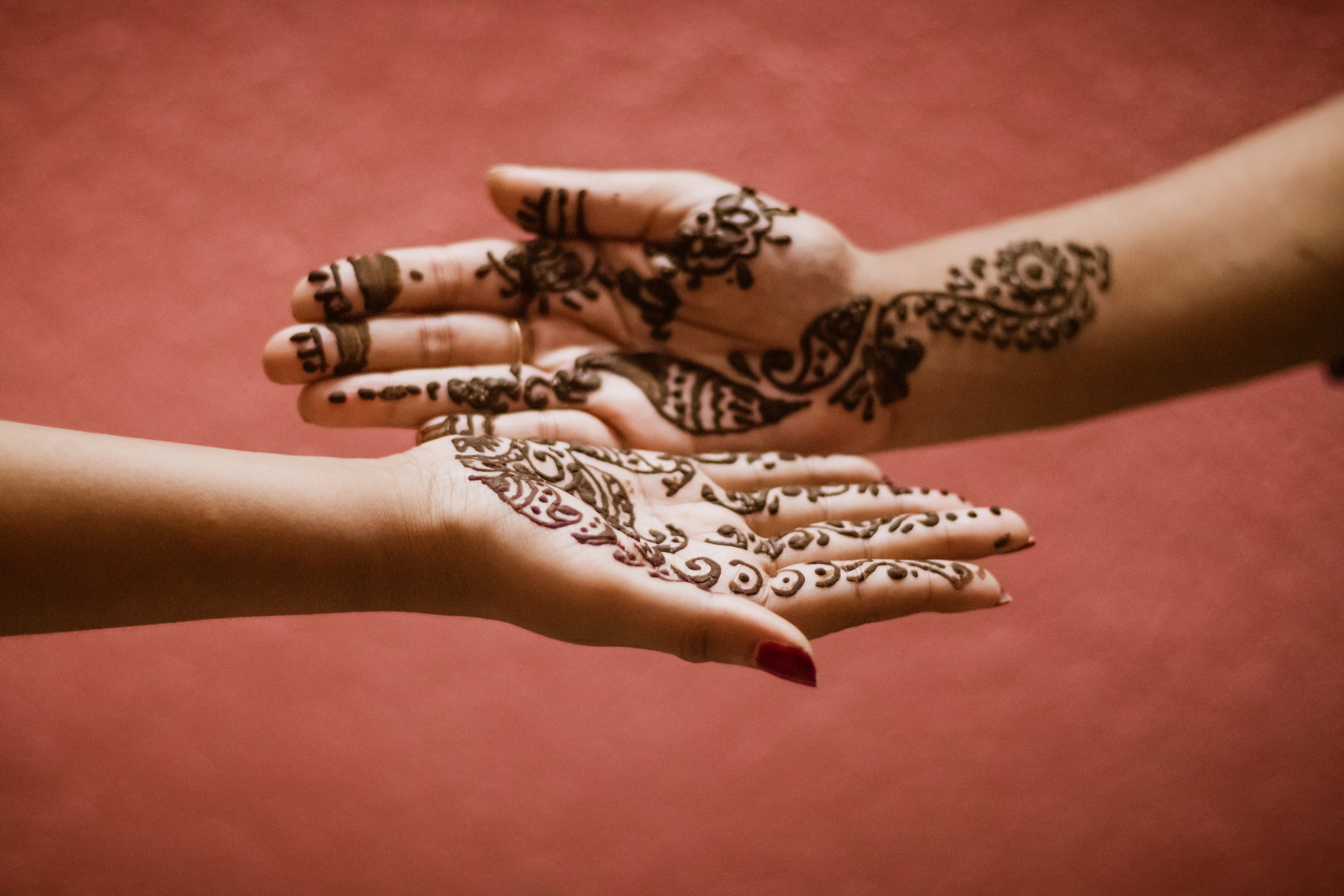 mehndi-designs-on-a-persons-palms.jpg